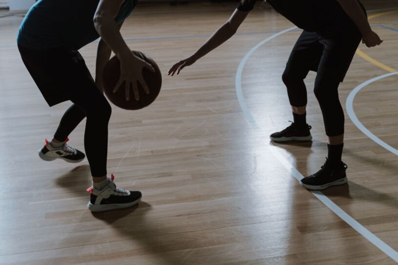Basketball players training indoors